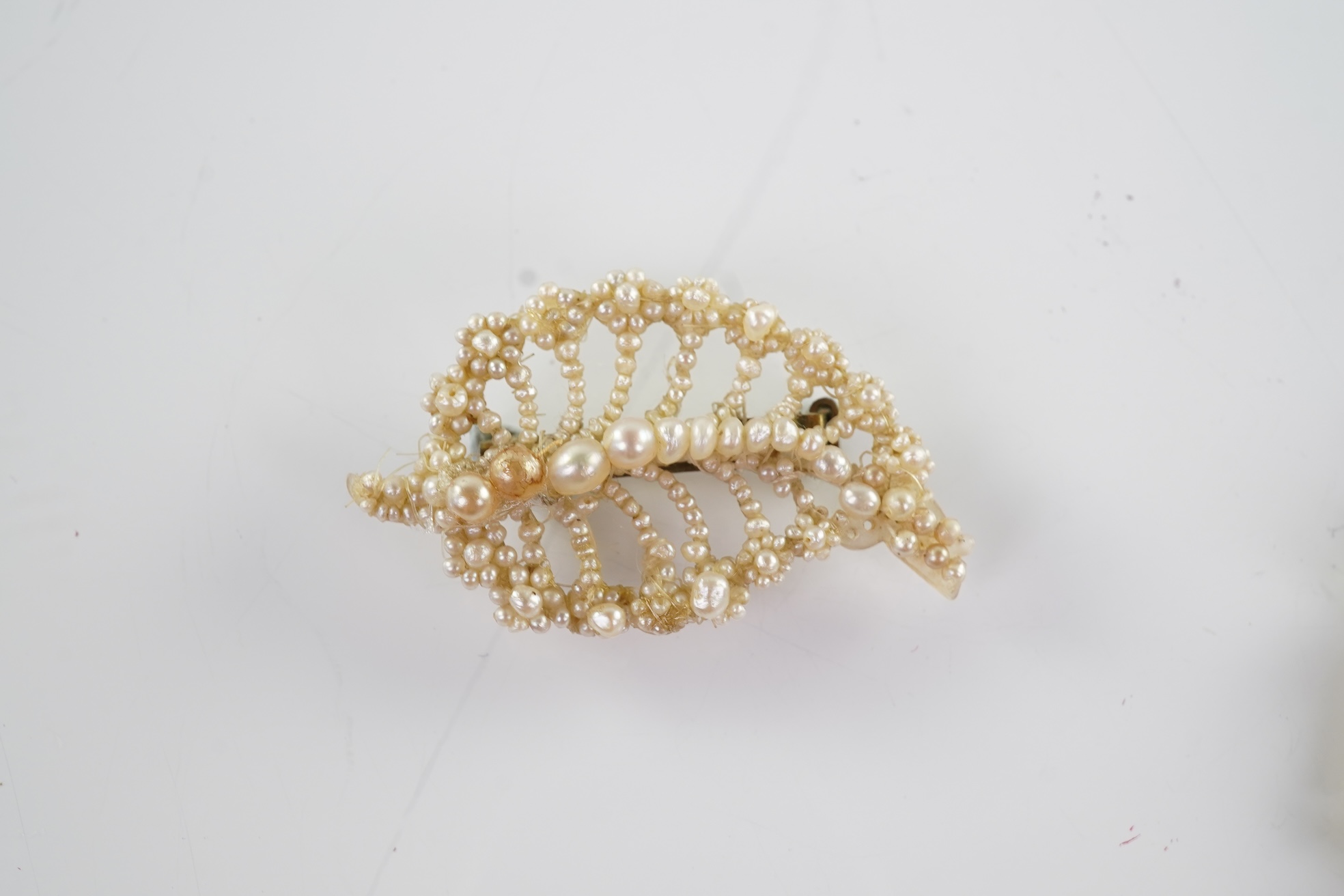 A Regency seed pearl necklace, brooch and pair of earrings, early 19th century